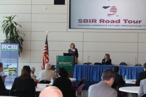 Anne Barth , executive director of TechConnect West Virginia, addresses the crowd at the 2015 SBIR Road Tour.