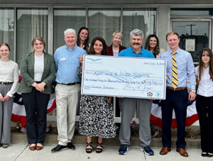 Legal Aid is presented with a check from the City of Parkersburg.